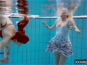 super-hot Russian gals swimming in the pool
