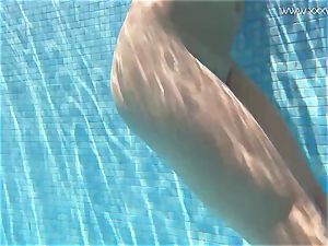 Jessica Lincoln smallish inked Russian nubile in the pool