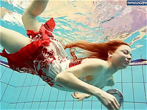 hot grind red-haired swimming in the pool